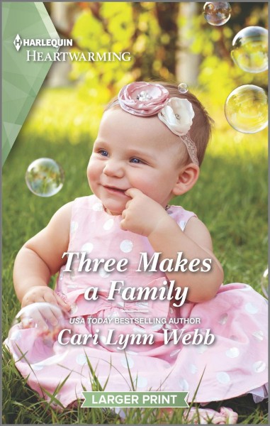 Three makes a family / Cari Lynn Webb.